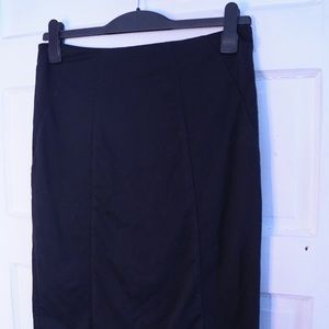 Black knee-length skirt
